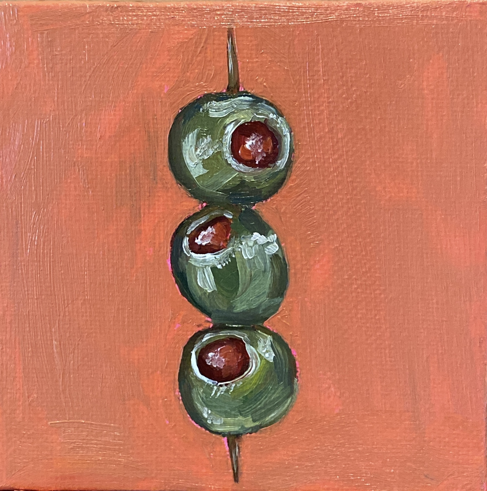 Painted olives on a colourful background